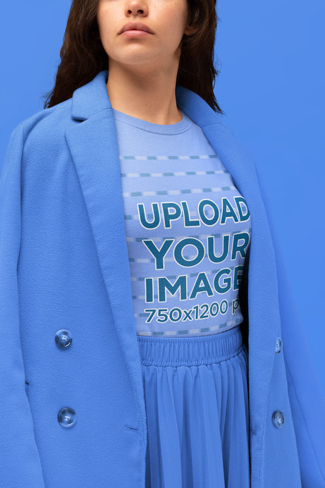 Monochromatic T-Shirt Mockup Featuring a Serious-Looking Woman at a Studio