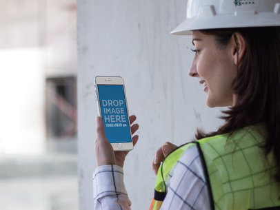 iPhone Mockup in Portrait Position of a Woman Architect at the Site