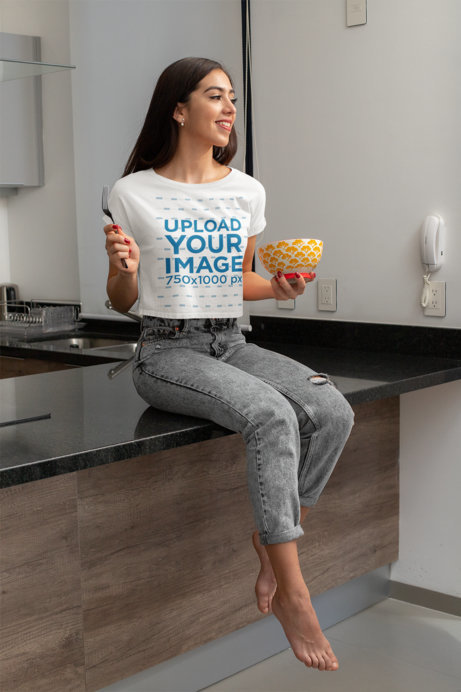 Crop Top Mockup of a Young Woman Eating a Healthy Breakfast