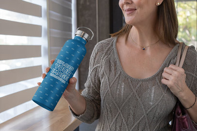 Cropped Face Mockup of a Middle-Aged Woman Holding an Aluminum Bottle 