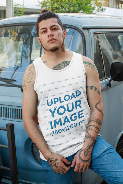 Tank Top Mockup Featuring a Man with Tattoos Posing by a Van 