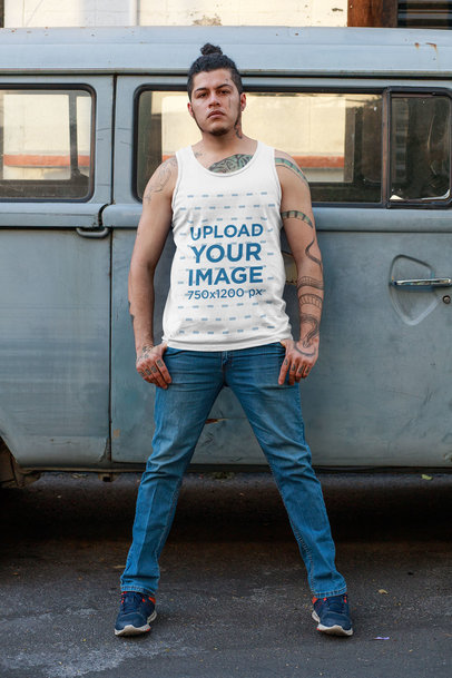 Tank Top Mockup Featuring a Tough-Looking Man Posing by Vintage Van