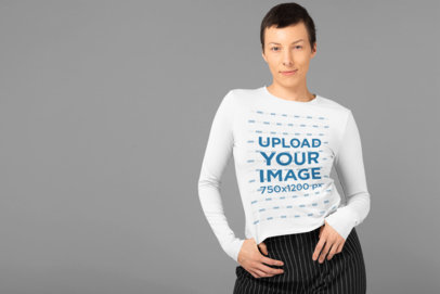 Long Sleeve Shirt Mockup Featuring a Woman with Androgynous Style at a Studio