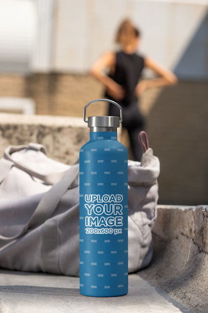 Aluminum Bottle Mockup Featuring a Woman in the Background