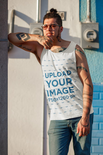 Tank Top Mockup of a Tattooed Man with a Hair Bun