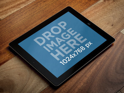  iPad Mockup Featuring a Wooden Floor