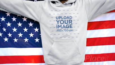 Hoodie Video of a Man Proudly Holding an American Flag