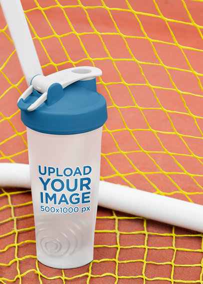 Mockup of a Blender Bottle Surrounded by a Soccer Goal's Net 33674