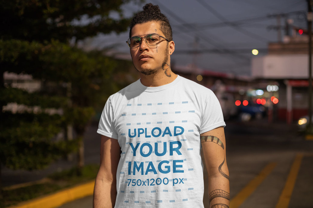 T-Shirt Mockup of a Man on the Street at Night