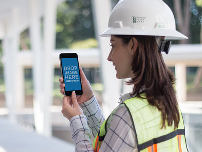 iPhone Mockup in Portrait Position of a Female Worker 