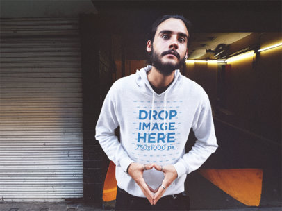 Urban Hoodie Mockup of a Young Man with Wide Eyes