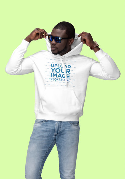 Pullover Hoodie Mockup Featuring a Stylish Man in a Studio