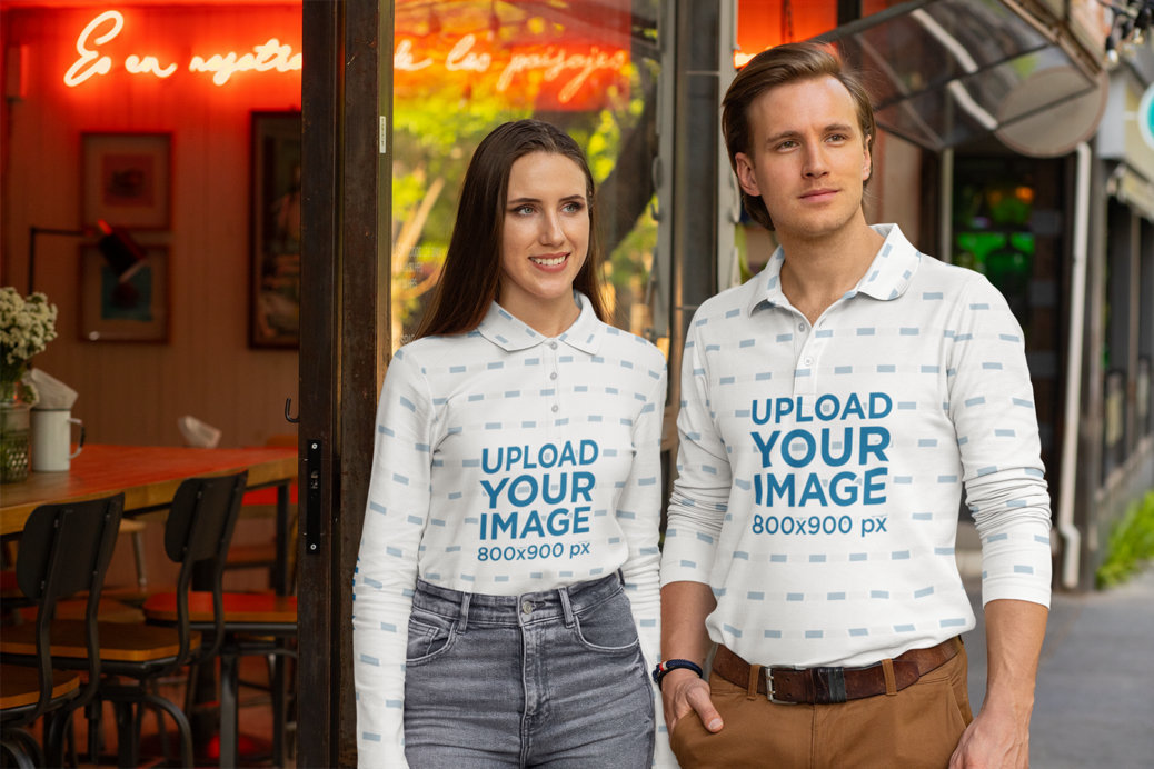 Placeit - Sublimated Long Sleeve Polo Shirt Mockup of a Couple at a Street