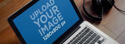 Mockup Featuring a MacBook Pro Placed by a Pair of Headphones 