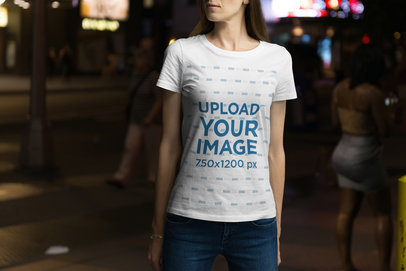 Mockup of a Woman Wearing a Customizable T-Shirt at Night 
