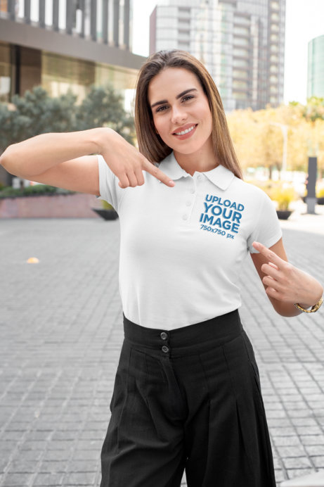 Mockup of a Woman Pointing at Her Polo Shirt
