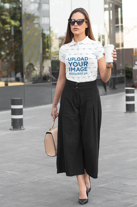 Polo Shirt Mockup of an Elegant Woman Walking Down the Street