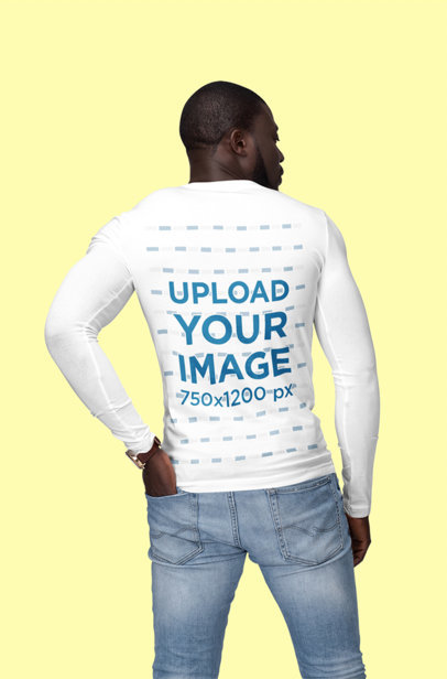 Back View Mockup of a Man Wearing a Customizable Long Sleeve Tee at a Studio 