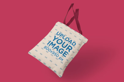 Mockup Featuring a Tote Bag Falling Against a Magenta Color Backdrop 3121 el1