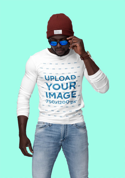 Mockup of a Man With Sunglasses and a Customizable Long Sleeve Tee at a Studio 