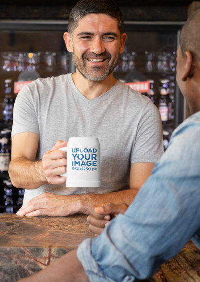 Mockup of a Man Holding a Beer Mug at a Bar