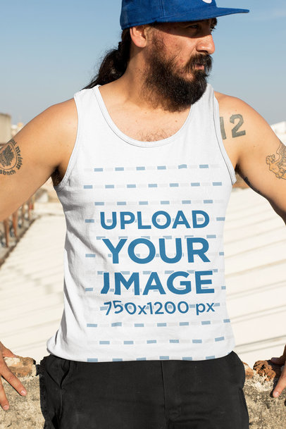 Mockup of a Man Wearing a Tank Top on a Sunny Day 