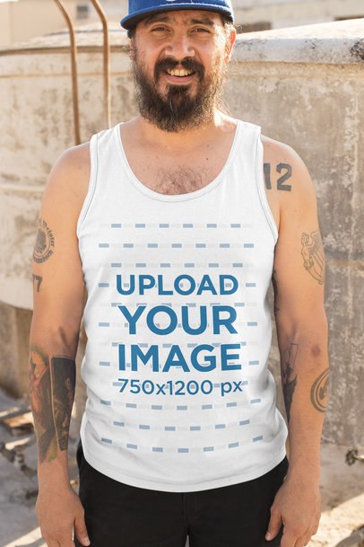 Tank Top Mockup of a Bearded Man with Tattoos on Both Arms 