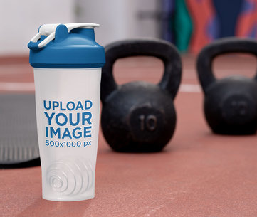 Blender Bottle Mockup with Some Kettlebells in the Background