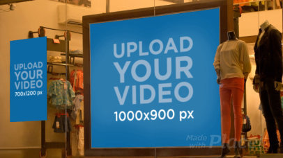 Video of a Poster and a Billboard in a Clothing Store Window Display