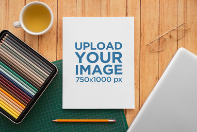 Mockup of a Sticker Placed on a Notebook