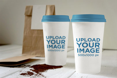 Mockup of Two Coffee Cups Next to Each Other