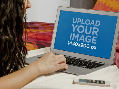  MacBook Air Mockup Featuring a Young Woman At Home 