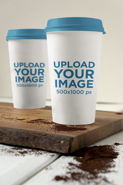 Mockup Featuring Two Coffee Cups Placed on a Wooden Board