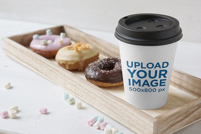 Mockup of a Paper Coffee Cup Place Next to Some Donuts 3781-el1