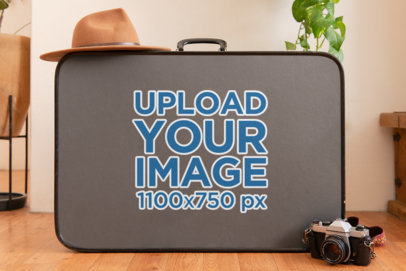 Sticker Mockup Featuring a Suitcase and Other Items