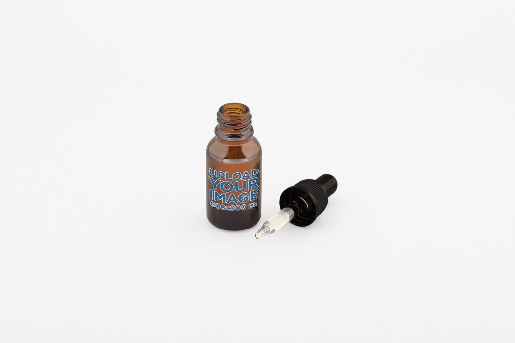 Mockup of an Open Glass Dropper on a Flat Surface