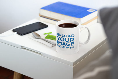 Mockup of an 11 oz Coffee Mug on a Nightstand 33670