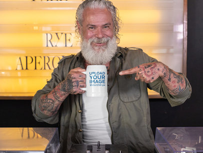 Mockup of a Senior Man Pointing at His 20 oz Beer Stein 33453
