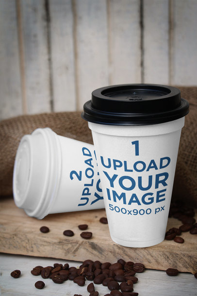 Mockup of Two Paper Cups Featuring Some Coffee Beans