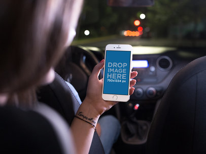 Mockup of a Woman Using Her iPhone 6 in the Car