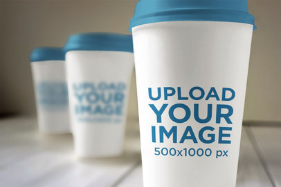 Mockup of Three Paper Coffee Cups 