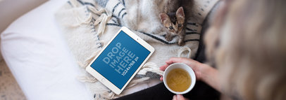 Woman in Bed with a Cup of Tea and her Cat iPad Mini Mockup