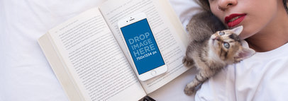 iPhone 6 Mockup of a Woman Lying in Bed with her Cat