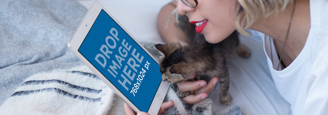Young Woman Relaxing with her White iPad Mini and Cat Mockup