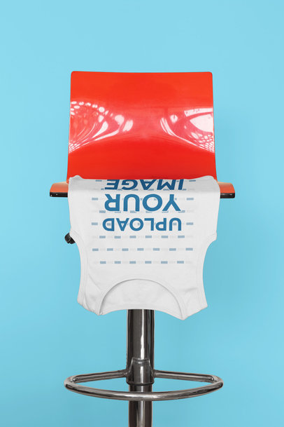 Mockup of a Tank Top About to Fall From a Chair 