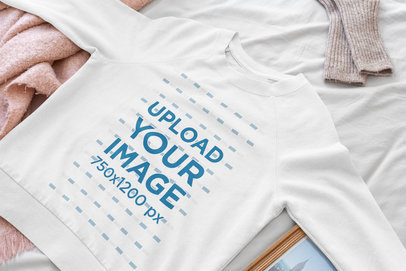 Mockup of a Woman's Crewneck Sweatshirt Lying on a Bed 33746