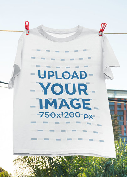 Mockup of a T-Shirt Hanging Outside a House 33724