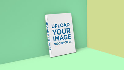 Book Mockup of a Hard-Cover Leaning on the Wall of a Colored Set 2433-el1