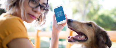 iPhone 6 Mockup Featuring a Trendy Woman and Her Dog