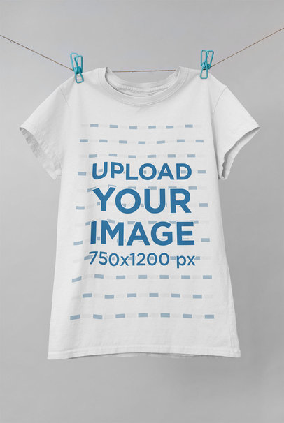 Mockup of a T-Shirt Hanging From a Thin Rope 